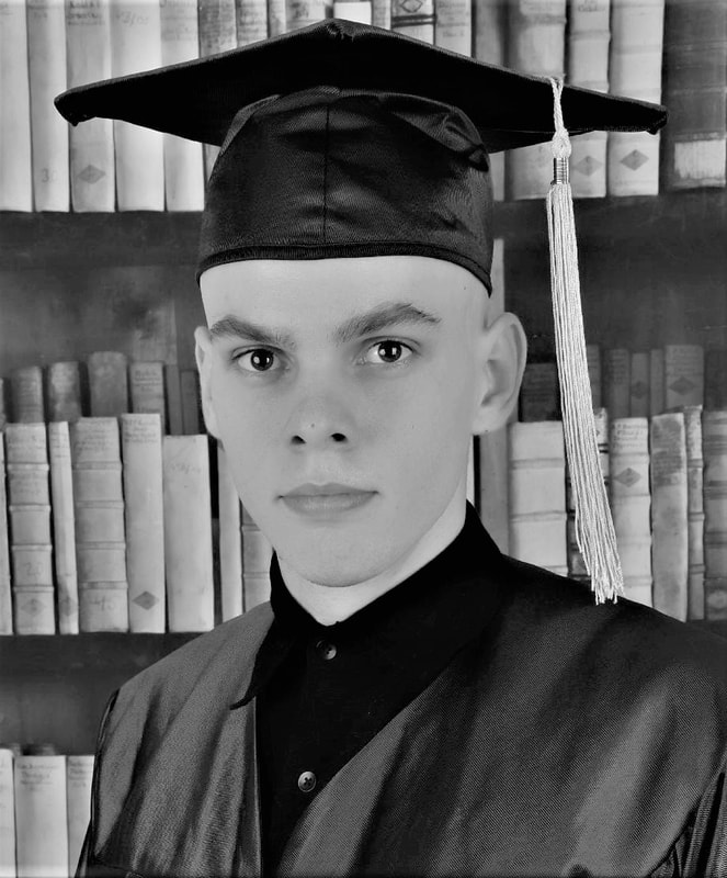 Teen in cap and graduation gown